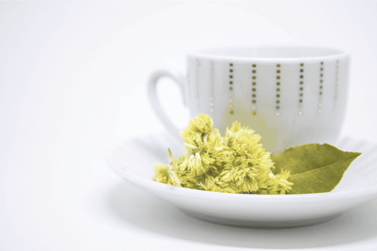 tea cup and saucer with tea for supporting wellness naturally